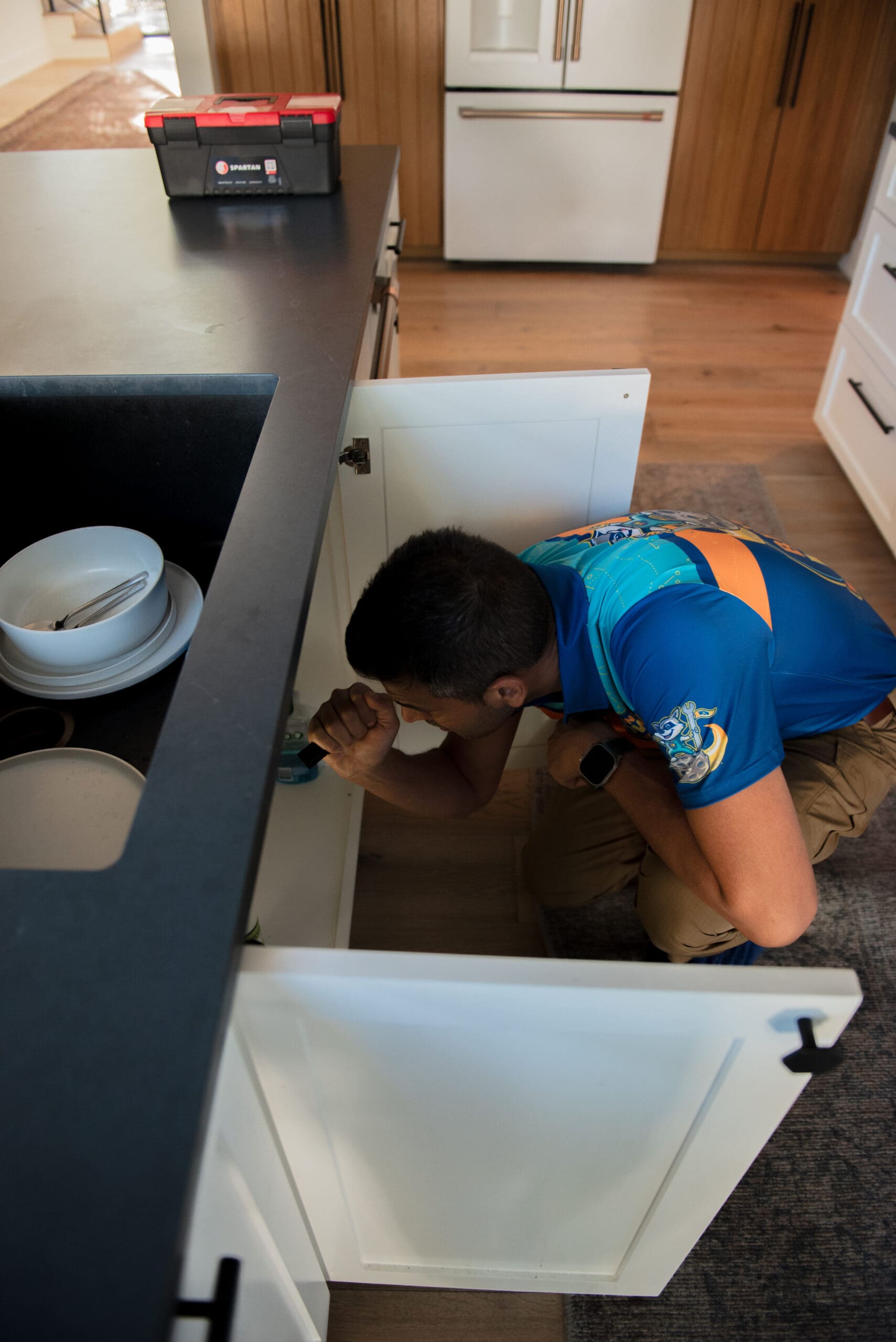 Beyond Wow Plumbing technician performing drain service