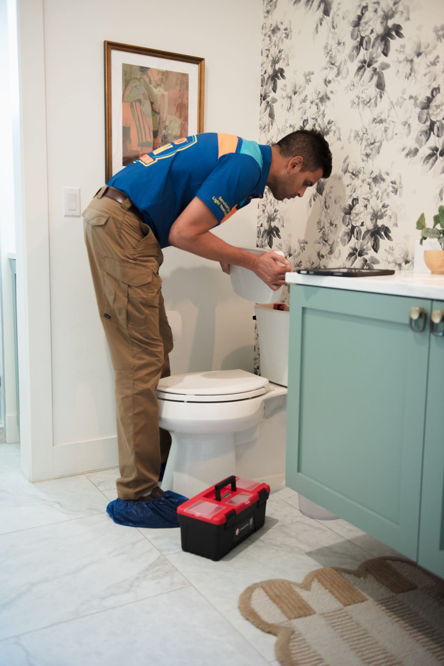 Beyond Wow plumber performing residential plumbing service