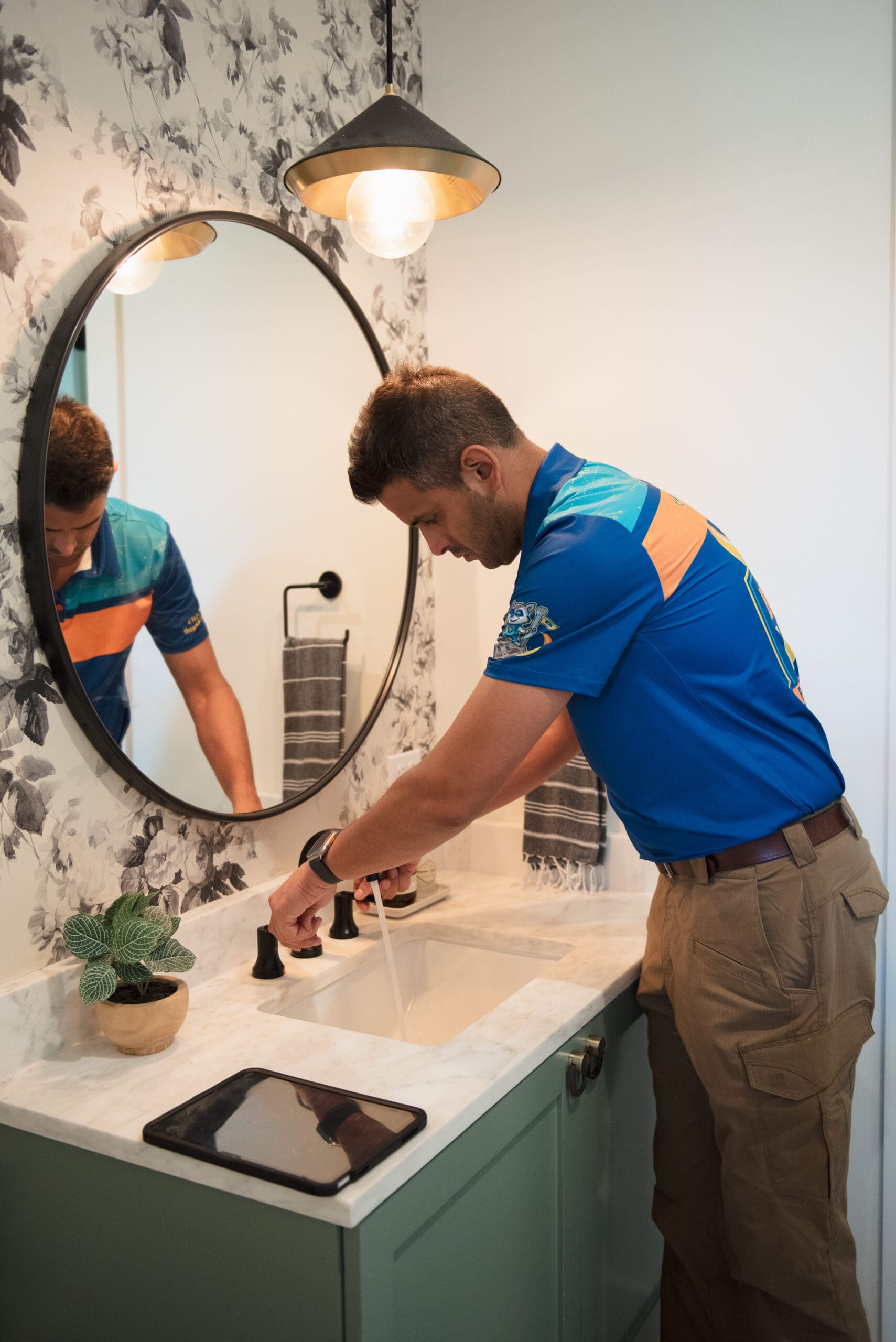 Beyond Wow Plumbing technician working on job site