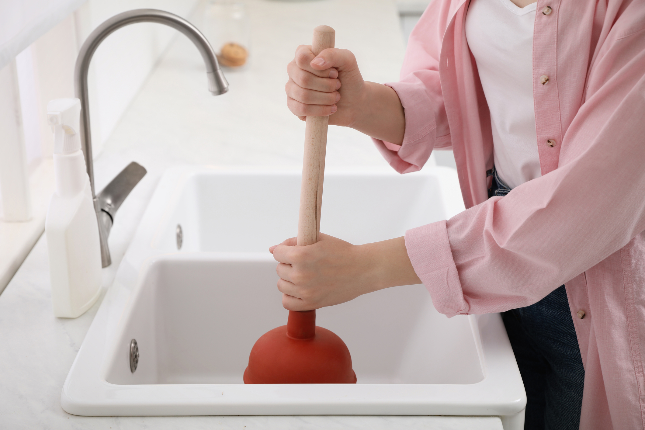 Beyond Wow professional plumber on repair job