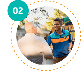 Beyond Wow technician shaking the hand of a homeowner in an orange circle frame with the number 2 in a teal circle in the left hand corner