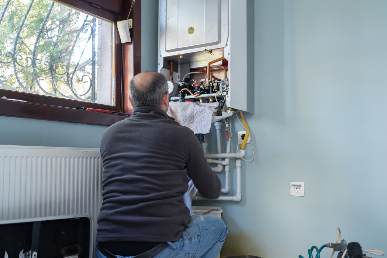 Gas boiler being repaired